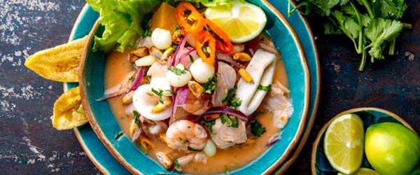 A bowl of seafood with maize and spices in Peru seafood with maize
