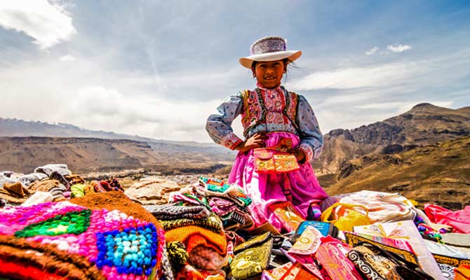 Market stalls on the road side near the Colca Canyon Looking to explore Peru on holiday? Colca Canyon is a must when on vacation in Peru