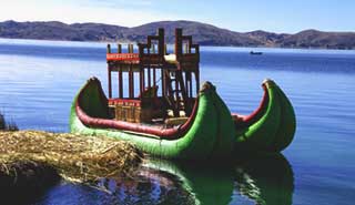 Puno is a city in southern Peru on Lake Titicaca Travel group on holiday experience the view from the reed islands at lake titicaca