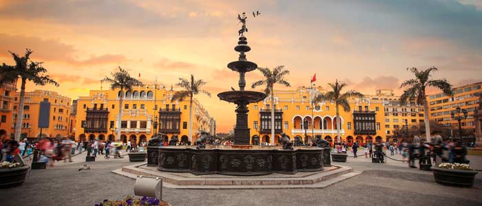 Tourist on a group tour visiting Plaza de Armas of Lima Plaza de Armas of Lima, travel to lima peru, lima peru travel, lima travel, lima peru travel packages