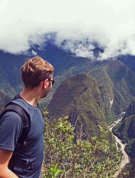 Young traveller on the day trek to Machu Picchu Man enroute to Machu picchu on a day trek trip excursion holiday