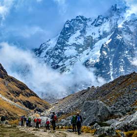 Tailor-made travel group hiking the salkantay trek on their way to Machu Picchu