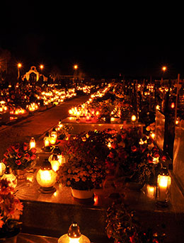 All Saint's Day in Poland candles and flowers in cemetaries for all saints day in poland