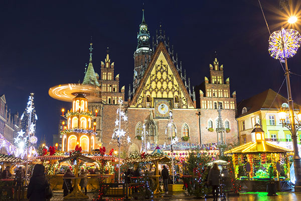 Christmas in Poland christmas market in poland with stalls and lights and games