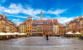 Poland Travel Advice historic town center with colourful buldings in Warsaw