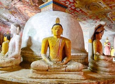 Visit the Dambulla Cave temples and see ancient statues/ art adventure travel tour with Tucan travel visits UNESCO World Heritage Site, Sacred Site, Cave Temple, Ancient Art