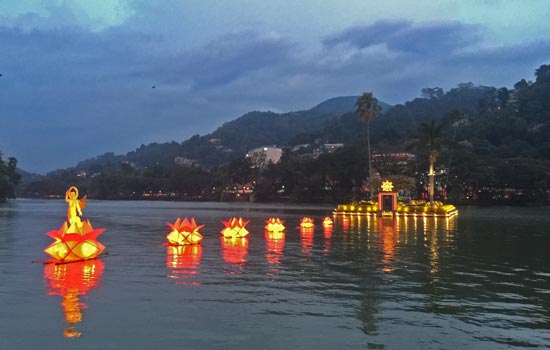 Sri Lankan holiday Deepavali festival of lights - holiday photo of Kandy lake in the centre of the city where there is so much to see Sri Lankan holiday LIGHTS FESTIVAL Deepavali IS ONE OF THE MUST SEE FESTIVALS WHEN EXPLORING THE ISLAND OF SRI LANKA