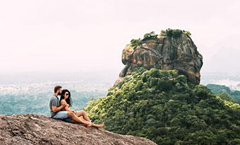 Couple looks over the valley surrounding Sigiriya sigiriya- tucan travel Tailormade