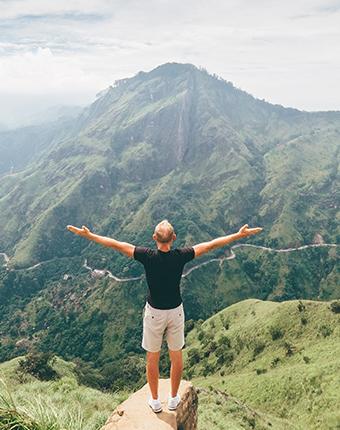 Solo Tourist looking over little adams peak Sri Lanka Adams Peak Tucan Travel