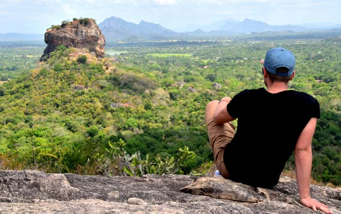 Solo traveller in awe of the view of Sigiriya, Sri Lanka travel advice explore sri lanka, discover tours sri lanka, top tips visit sri lanka, best highlights in sri lanka
