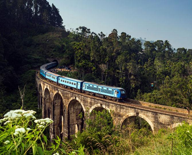 Ride the train over Demadora Nine Arch Bridge in Ella, highlight of sri lanka adventure trip, travel to sri lanka