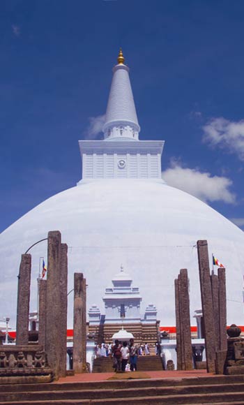 Tourist photo whilst on holiday visiting holy sacred stupa in Anuradhapura, Sri Lanka Sri Lanka has numerous stupa's and Anuradhapura is one of the best locations to visit when on vacation travelling the country