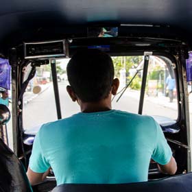 Tourist view whilst riding in the back of a tuk-tuk on tour through Negombo Tuk-tuks are a fast and cheap way to get around in sri lanka