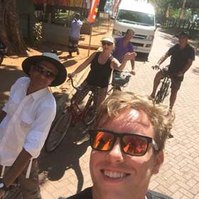 Tucan Travel adventure holiday tour group exploring around ancient ruins of Polonnaruwa on bicycles Tucan travel adventure holiday trip group travelling around ancient ruins of Polonnaruwa