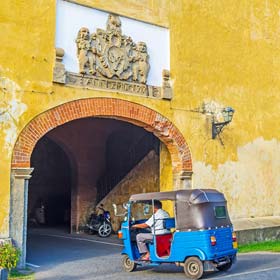 Tuk-tuk exiting Galle Fort's Old Gate Tuk tuk's are a quick way to get around in Sri Lanka when exploring the country