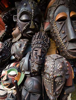 Karibu Travel & Tourism Fair, Tanzania traditional wooden african masks being sold at karibu travel and tourism fair in tanzania