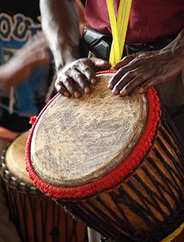 Sauti za Busara Festival, Tanzania man playing drums at the sauti za busara festival in zanzibar tanzania