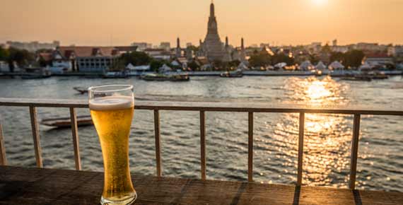 Beer is a popular drink for alot of tourists and traveller in the heat of bangkok humidity and its even better as you look over the sunset oand views of the city