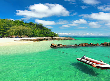 The emerald green waters of Paradise Beach in Phuket, Thailand visit Paradise Beach on a Tucan Travel group tour to Phuket
