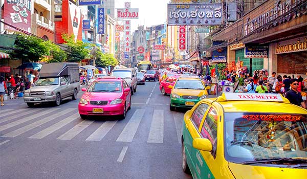 Tuk-tuk's are one of the most popular forms of travel within Thai cities getting around cities in Thailand by taxi or tuk-tuk