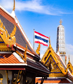 The flag of Thailand is a symbol of national pride The Thai flag flying proud on the Grand Palace in Thailand