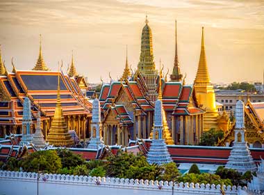 The beautifully designed Grand Palace - a top attraction in Bangkok, Thailand The Grand Palace at sunset, located in Bangkok Thailand