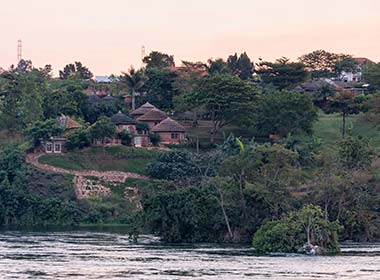 village on side of the river in jinja in uganda
