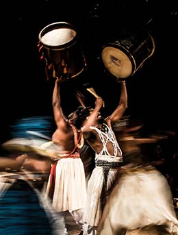Bayimba International Festival of Music & Arts, Uganda two uganan people performing music and dance for bayimba international festival of music and arts in uganda