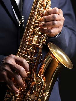 Nile Gold Jazz Safari, Uganda man playing saxophone at the nile gold jazz safari in kampala uganda