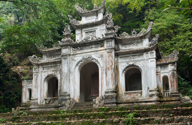 An ancient gateway at the Perfume Pagoda Explore the hidden temples of the Perfume Pagoda