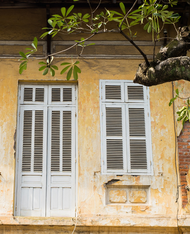 Rustic shutters in the Old Quarter Explore the ancient streets of Hanoi's Old Quarter