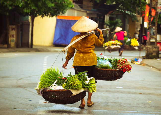 A local woman from Hanoi Discover the heroic exploits and daily lives of Hanoi's women