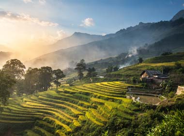 Holiday tourists visit Sapa which is an absolute stunning landscape of rice fields on tiers on hill sides.