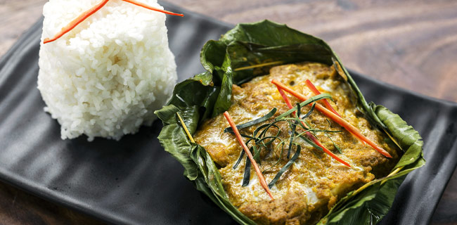 Traditional fish amok Khmer fish amok served with steamed rice