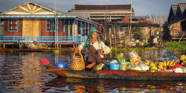 Fruit and veg on floating market Holiday tours visit many markets and stall for tourist to experieicne the food and culture in Cambodia