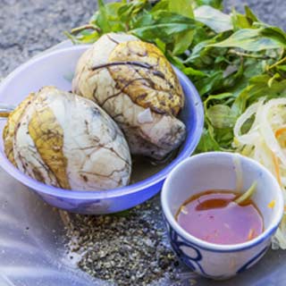 Balut is aa fertilised embryo of a duck and eaten whole which the locals believe to be very high in protein