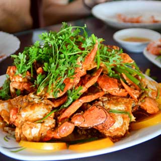 stir fried crab is a common dish found in Kampot or Kep