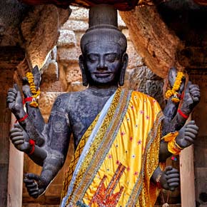 Historic Angkor Wat statue ancient buddhist statue in Angkor Wat