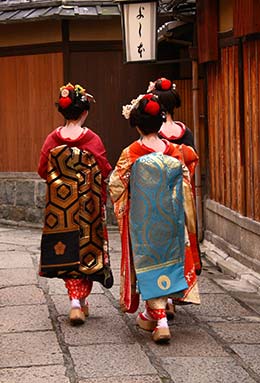 Gion Matsuri, Japan three geishas walking in gion kyoto japan for gion matsuri event in japan