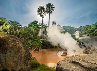 a hot spring called hell pool due to the muddy colour in yufuin in japan