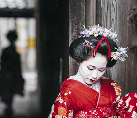 Geisha walking the street of Gion, Kyoto Maiko Geisha walking in the street of Gion Kyoto