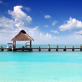 Bacalar, Mexico clear sea and wooden boardwalk best time to visit mexico beaches