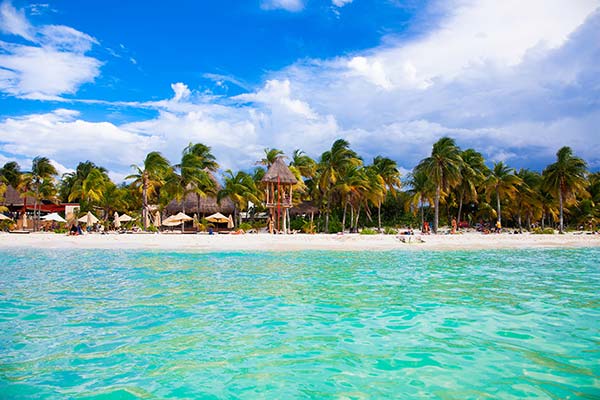 Norten Beach, Isla Mujeres island, Cancun, Mexico Norten beach on colorful Isla Mujeres island near Cancun in Mexico best time to visit mexicos beaches