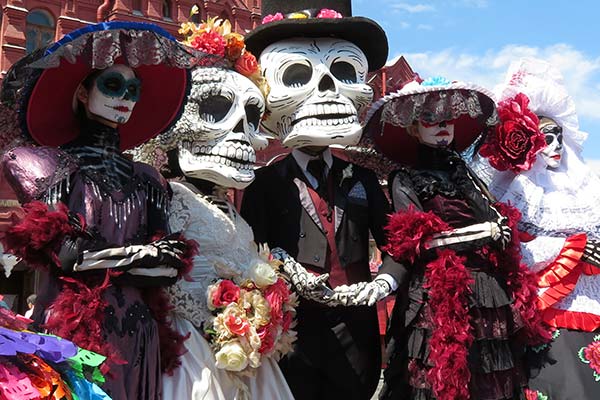 Day of the Dead, Mexico people dressed in skeleton costumes for parade day of the dead mexico event