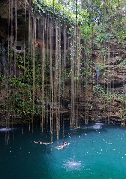 Ik-Kil cenote near Chichen Itza, Mexico swimming in caves in mexico Ik-Kil cenote near Chichen Itza, Mexico