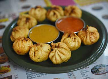 A signature dish of nepal would have to be momos definitely someyhing to experience when on holiday in nepal
