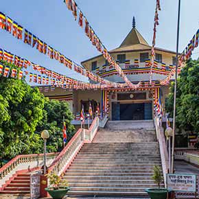 Nepalese monastery in Lumbini surrounded by the Himalayan mountain is a great cultural experience to visit whilst on your trip of nepal