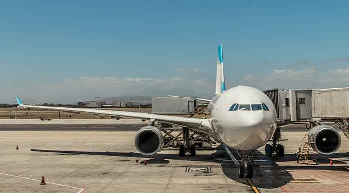 Cape Town International Airport A plane sits on the tarmac at Cape Town International airport ready for boarding