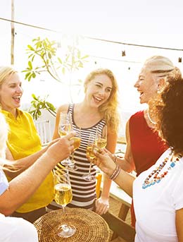 Cape Times Waterfront Wine Festival a group of people doing a toast with wine at the capes times waterfront wine festival in south africa