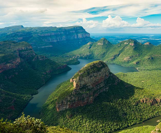 ariel view of he countryside lakes blue skies green hills at blyde river canyon nature reserve south africa